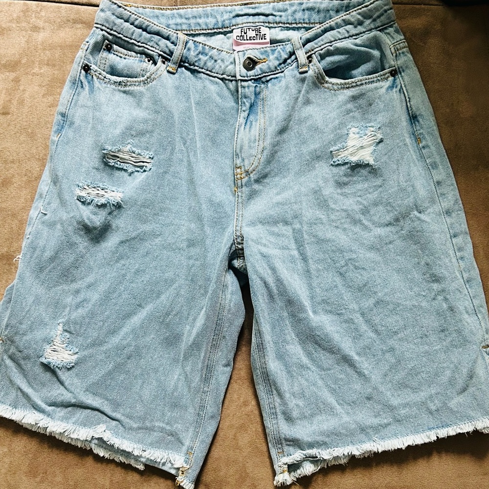 Ripped Light Blue Denim Shorts